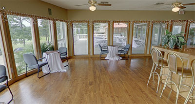 Photo of the upstairs lounge area looking toward the deck