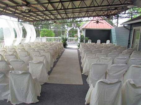 Photo of the upper deck set up for a wedding ceremony
